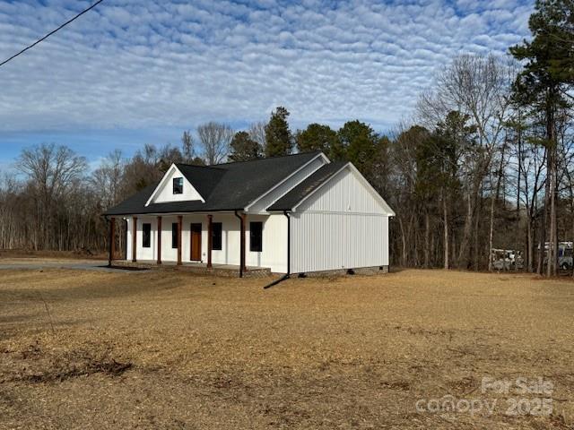 3006 Polkville Road Shelby, NC 28150 - Photo 3 of 29 a view of a house with a yard