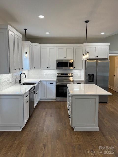 3006 Polkville Road Shelby, NC 28150 - Photo 9 of 29 a kitchen with kitchen island granite countertop a sink a counter top space stainless steel appliances and cabinets