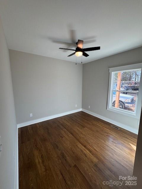 3006 Polkville Road Shelby, NC 28150 - Photo 10 of 29 wooden floor in an empty room with a window