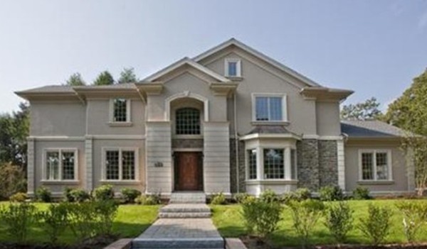 80 Dorcar Road Newton, MA 02459 - Photo 1 of 19 a front view of a house with a yard