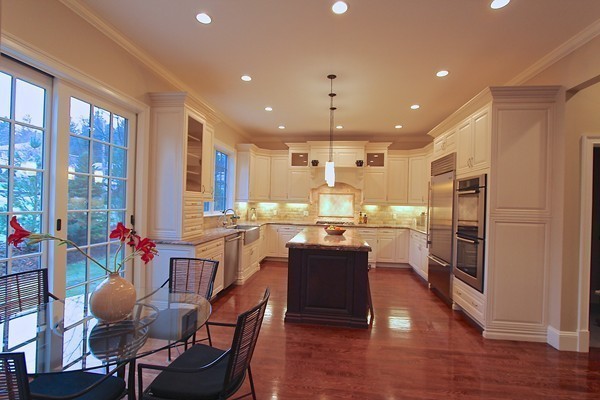 80 Dorcar Road Newton, MA 02459 - Photo 3 of 19 a large kitchen with a table and chairs