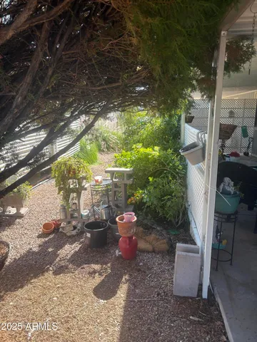 a view of a porch with garden