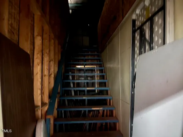 a view of a cafe with sitting area