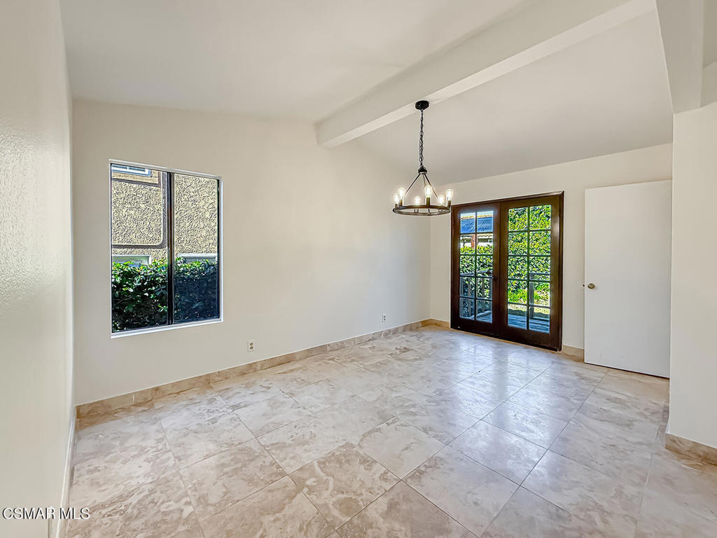 4007 Doneva Road Moorpark, CA 93021 - Photo 13 of 58 an empty room with windows and outdoor view