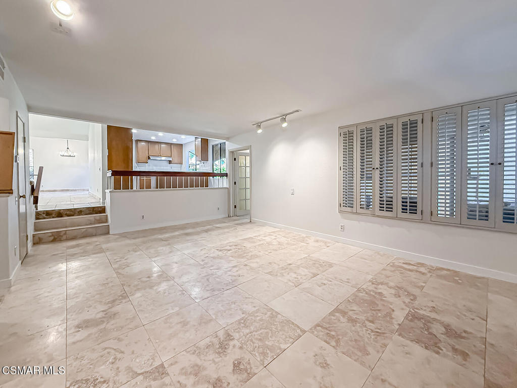 4007 Doneva Road Moorpark, CA 93021 - Photo 17 of 58 a view of a big room with windows and cabinet