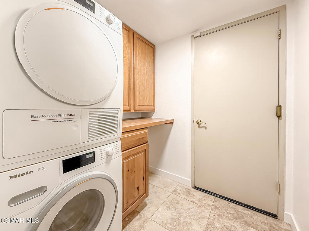 4007 Doneva Road Moorpark, CA 93021 - Photo 20 of 58 a view of a storage & utility room with washer and dryer