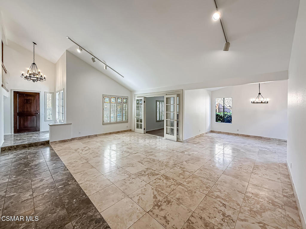 4007 Doneva Road Moorpark, CA 93021 - Photo 6 of 58 an empty room with windows and fireplace