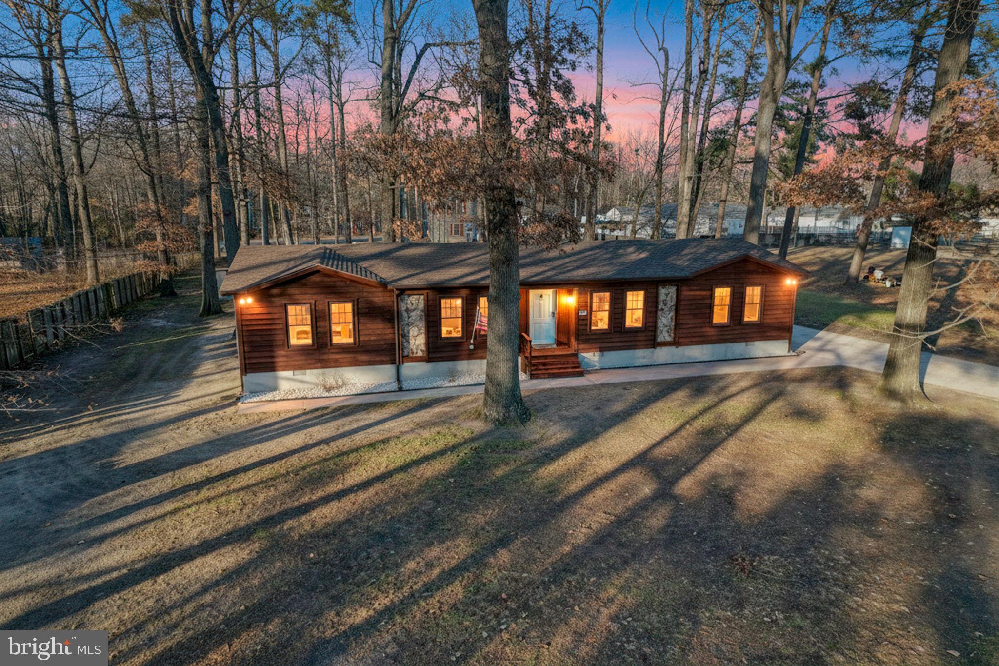 a view of a yard in front of the house