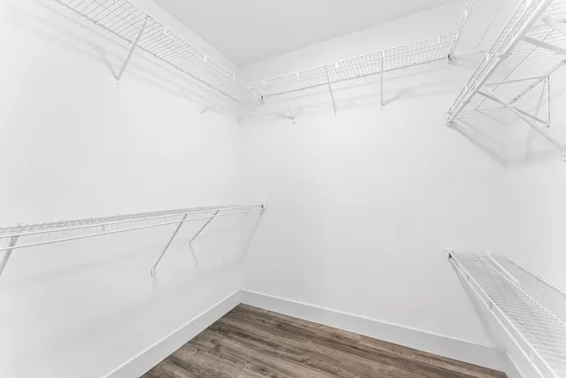 a bathroom with a toilet and a bathtub