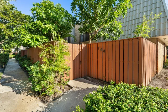 a view of a house with a snow in the yard