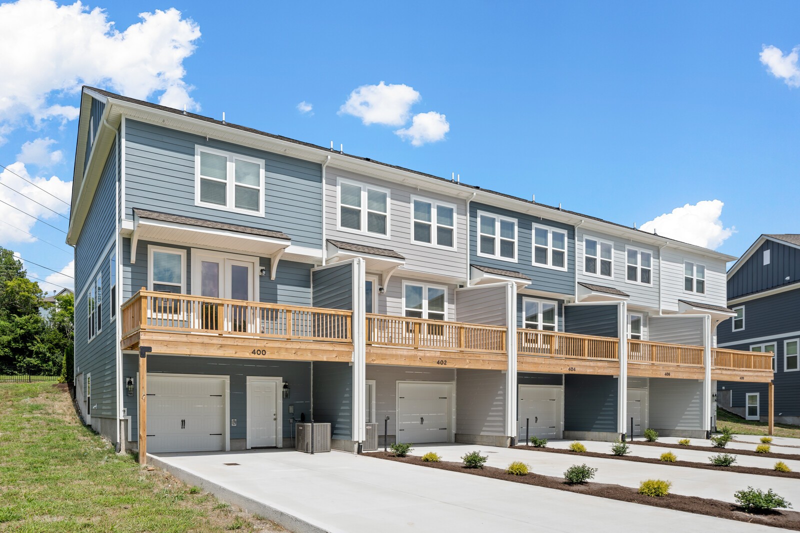 400 Blair Road Smyrna, TN 37086 - Photo 35 of 37 a front view of a building with a garden and plants