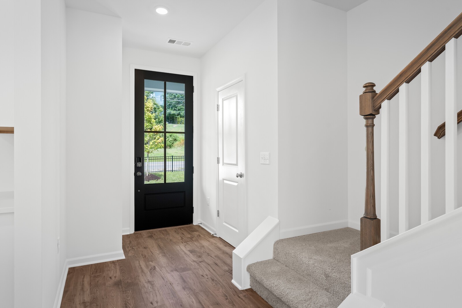 400 Blair Road Smyrna, TN 37086 - Photo 6 of 37 a view of entryway with wooden floor and cabinet