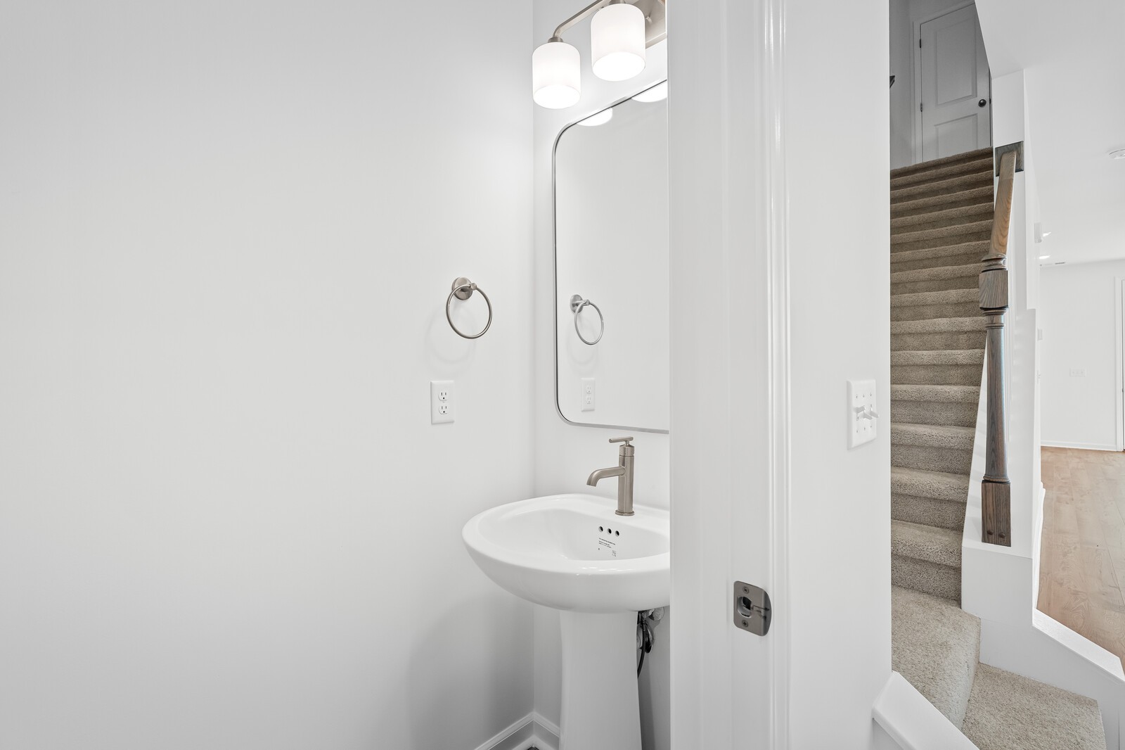 400 Blair Road Smyrna, TN 37086 - Photo 7 of 37 a bathroom with a sink a light fixture and a mirror