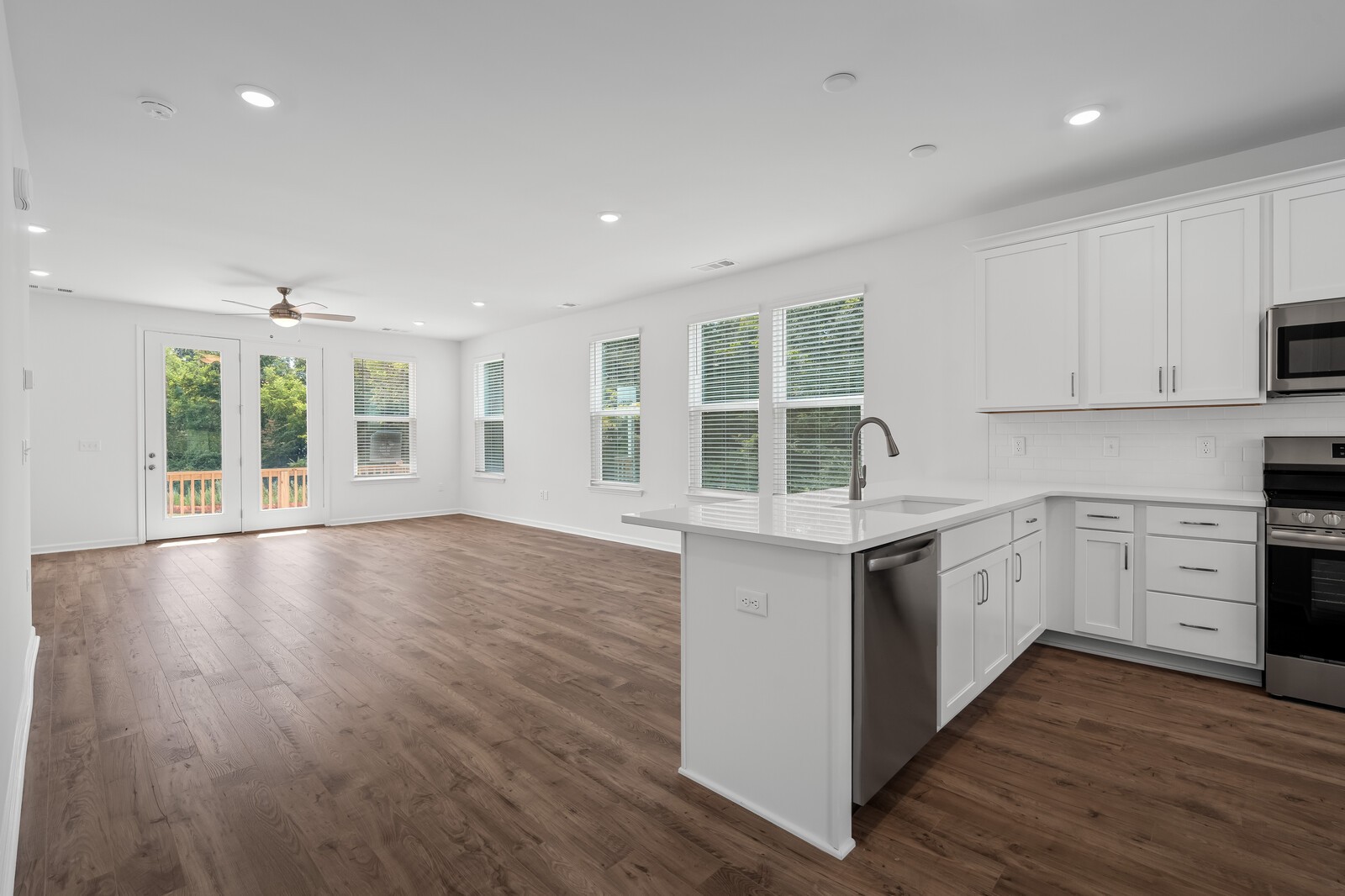 400 Blair Road Smyrna, TN 37086 - Photo 8 of 37 a kitchen with stainless steel appliances granite countertop a stove and a wooden floors