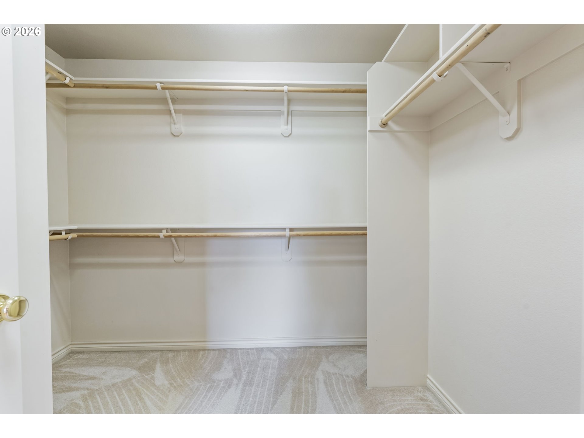 9907 Northwest Bartholomew Drive Portland, OR 97229 - Photo 24 of 37 a view of a room with racks on the wall