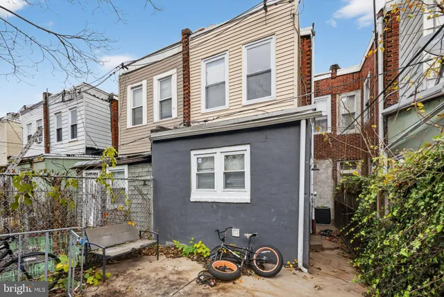 a front view of a house with parking