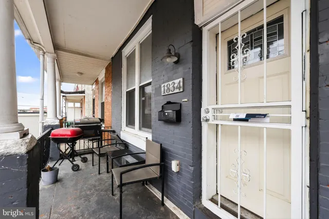 a view of a livingroom with furniture and window