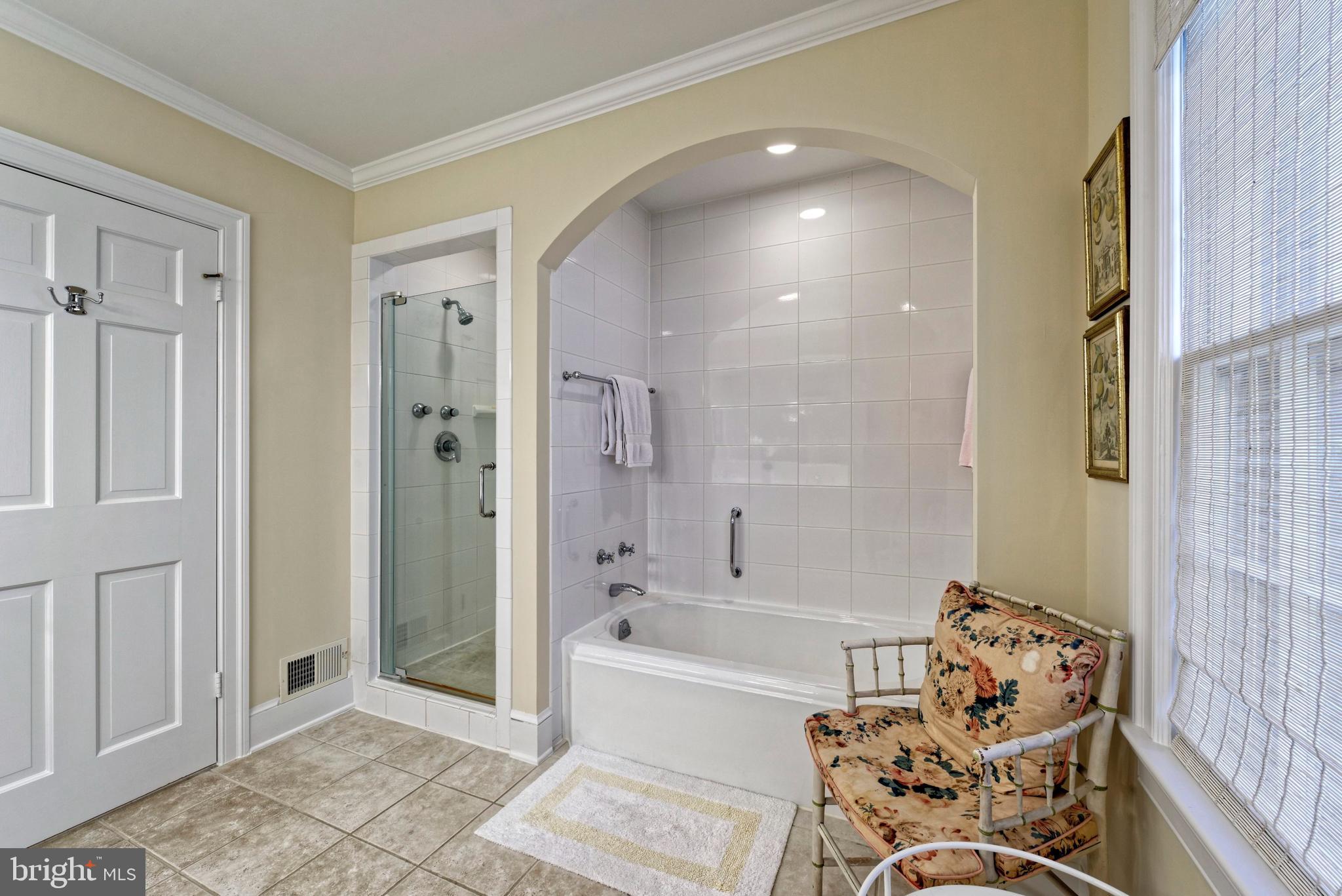 4392 Carrington Road Markham, VA 22643 - Photo 22 of 59 a bathroom with a bathtub and shower