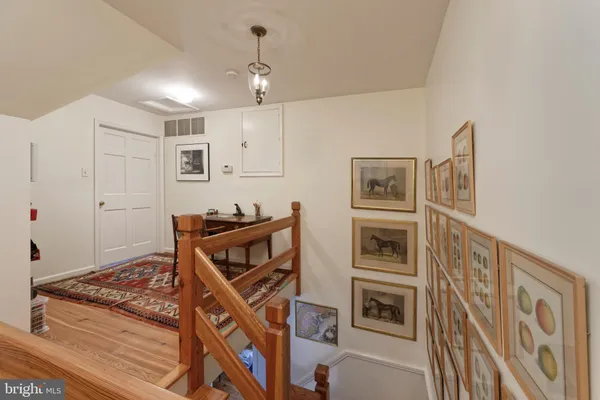 a bedroom with a bed and a walk in closet
