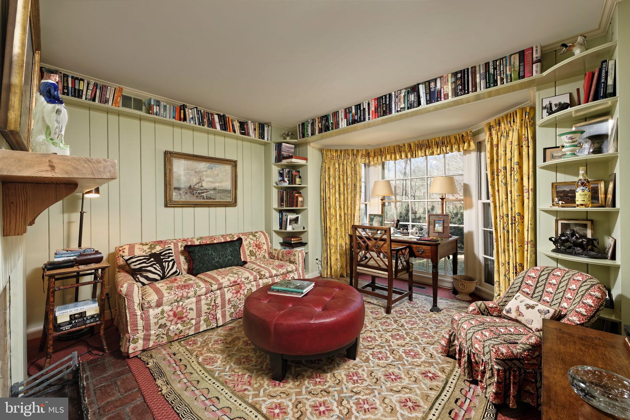 4392 Carrington Road Markham, VA 22643 - Photo 8 of 59 a living room with furniture and a book shelf