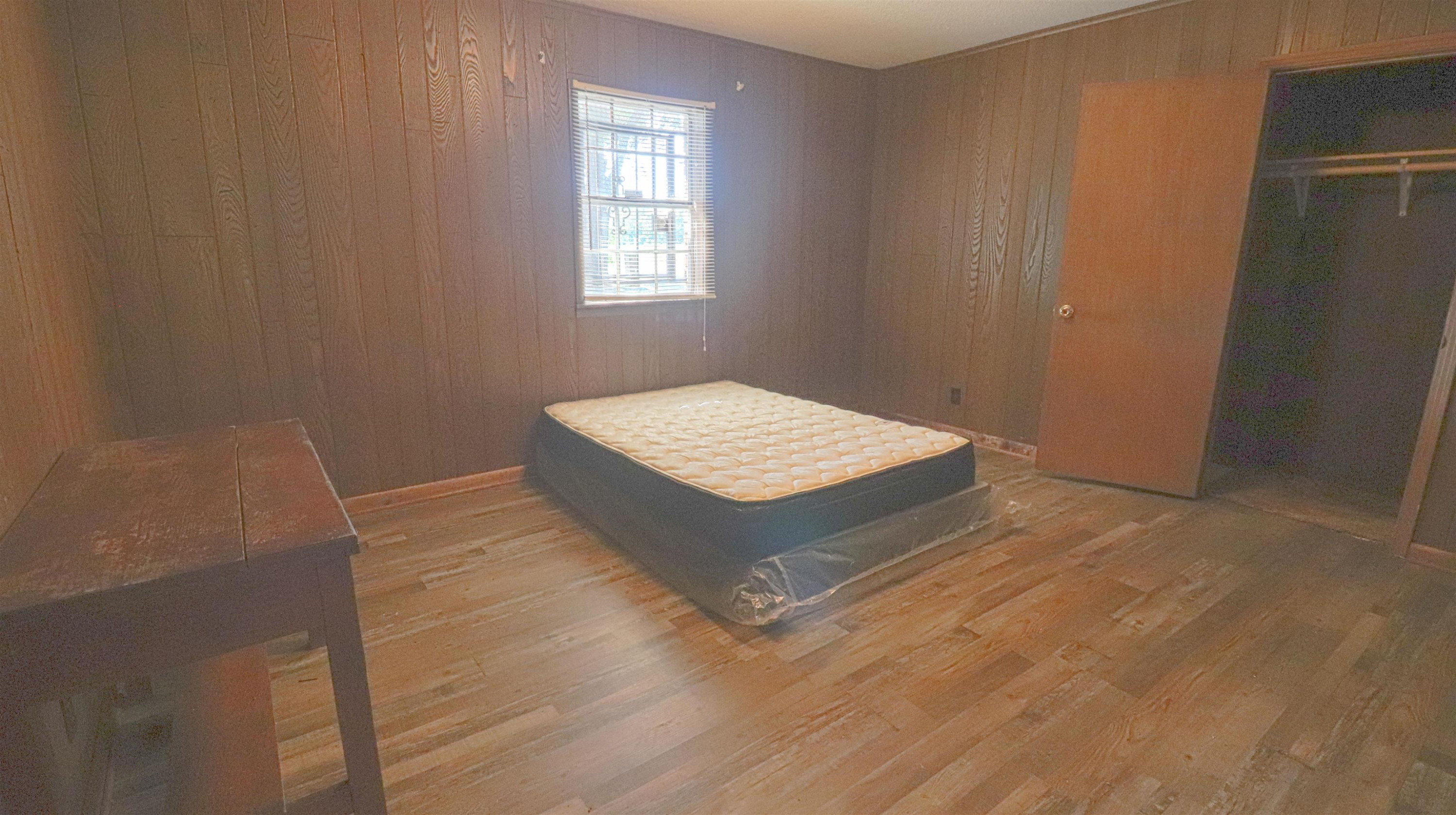 1040 Uptonville Road Mercer, TN 38392 - Photo 8 of 16 a room with a bed and a window