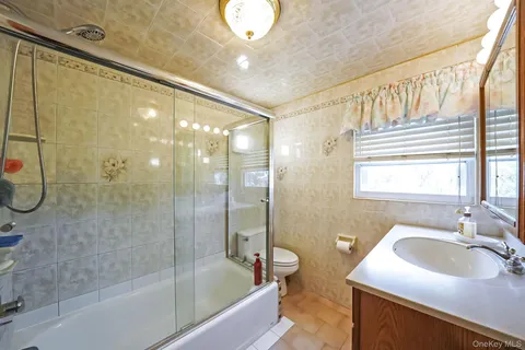 a bathroom with a sink and a bathtub