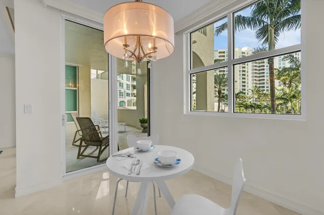 a spacious bathroom with a sink a mirror and a shower