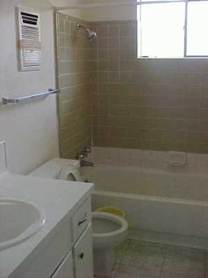 750 Purdue Road Corpus Christi, TX 78418 - Photo 3 of 8 a bathroom with a sink a toilet and shower