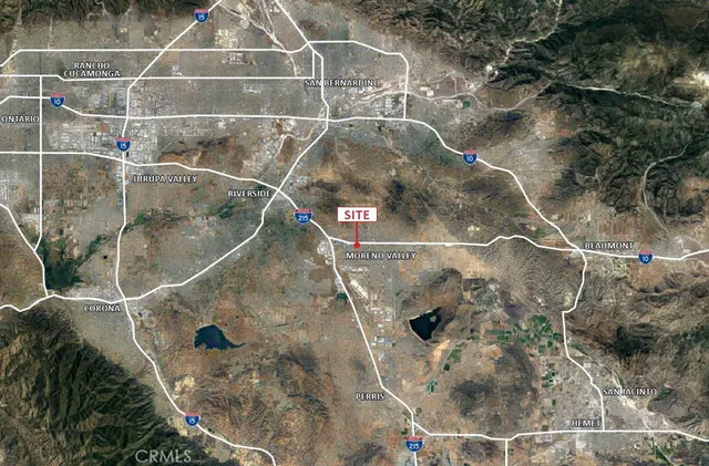 a front view of a building with parking area