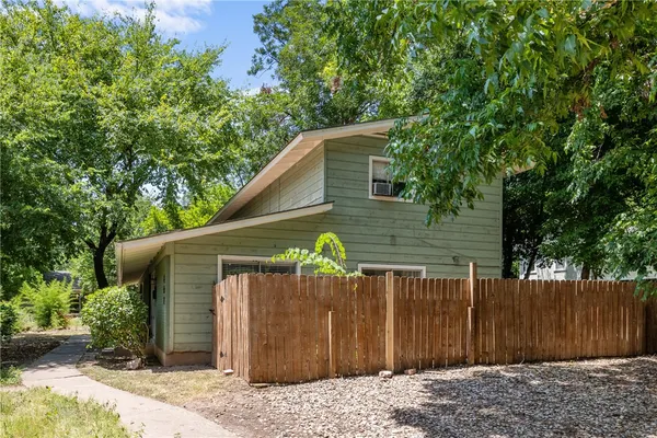 a front view of a house having yard
