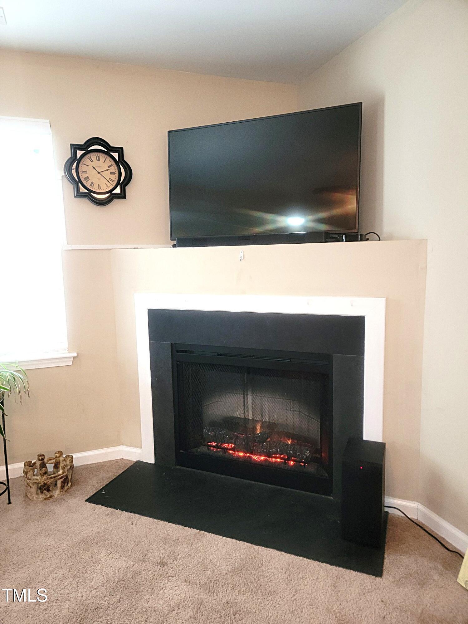 5126 Thornton Knoll Way Raleigh, NC 27616 - Photo 7 of 23 Fireplace