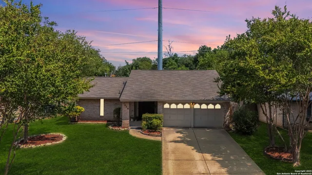a view of a house with a garden