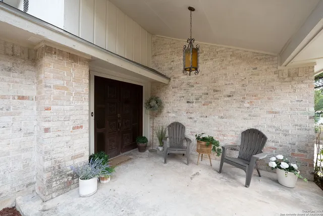 a dining room with furniture and a fireplace