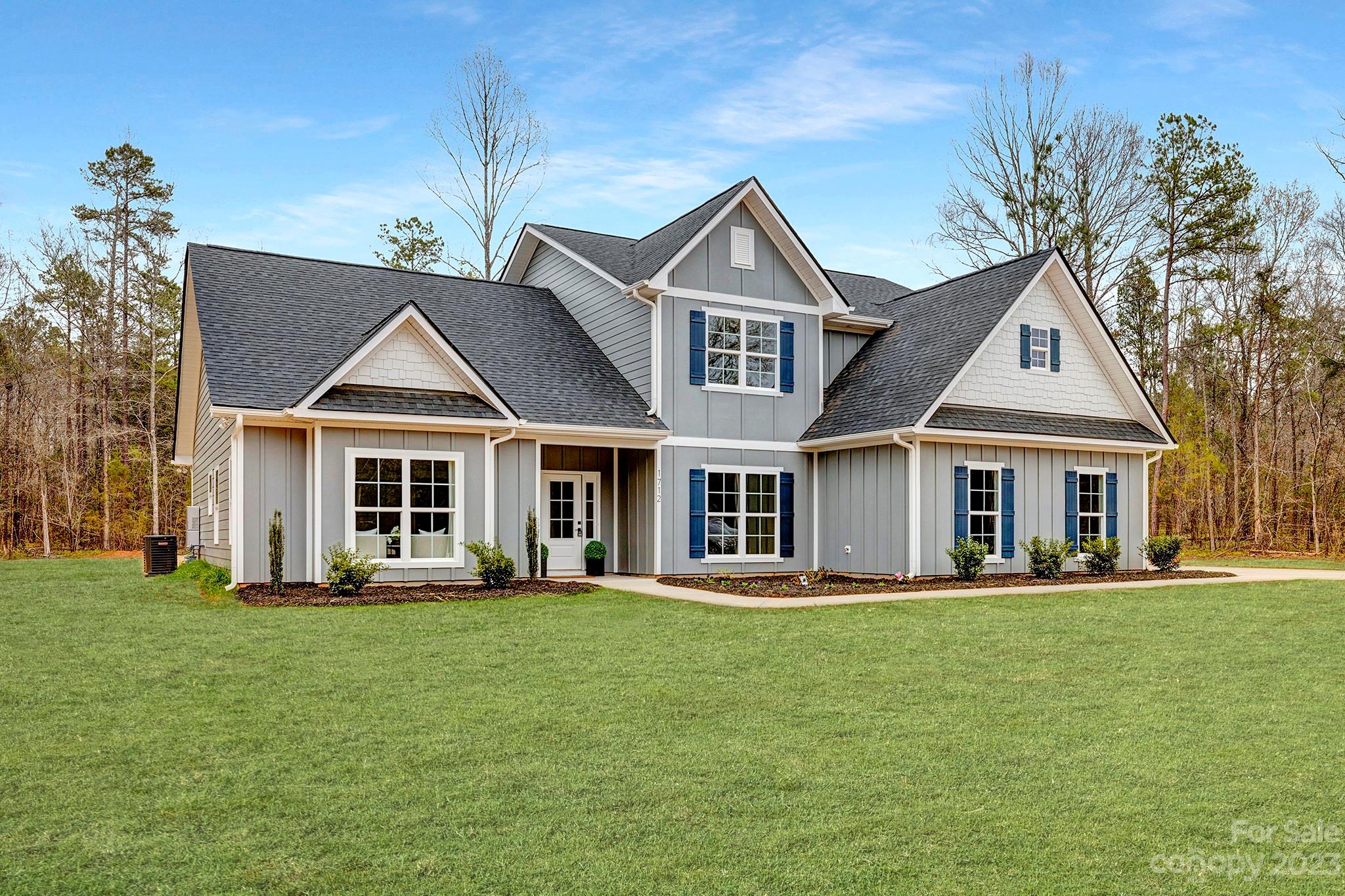 1712 Greyfox Estates Road Lancaster, SC 29720 - Photo 2 of 32 a front view of a house with a yard