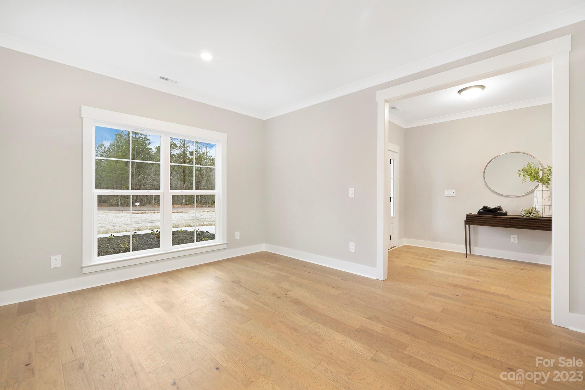 1712 Greyfox Estates Road Lancaster, SC 29720 - Photo 4 of 32 wooden floor in a room with a window