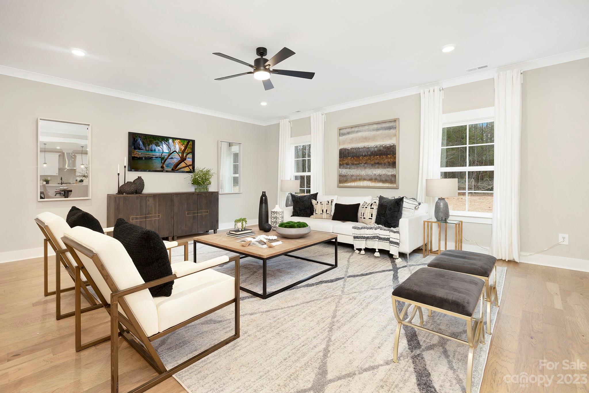 1712 Greyfox Estates Road Lancaster, SC 29720 - Photo 6 of 32 a living room with furniture and a flat screen tv