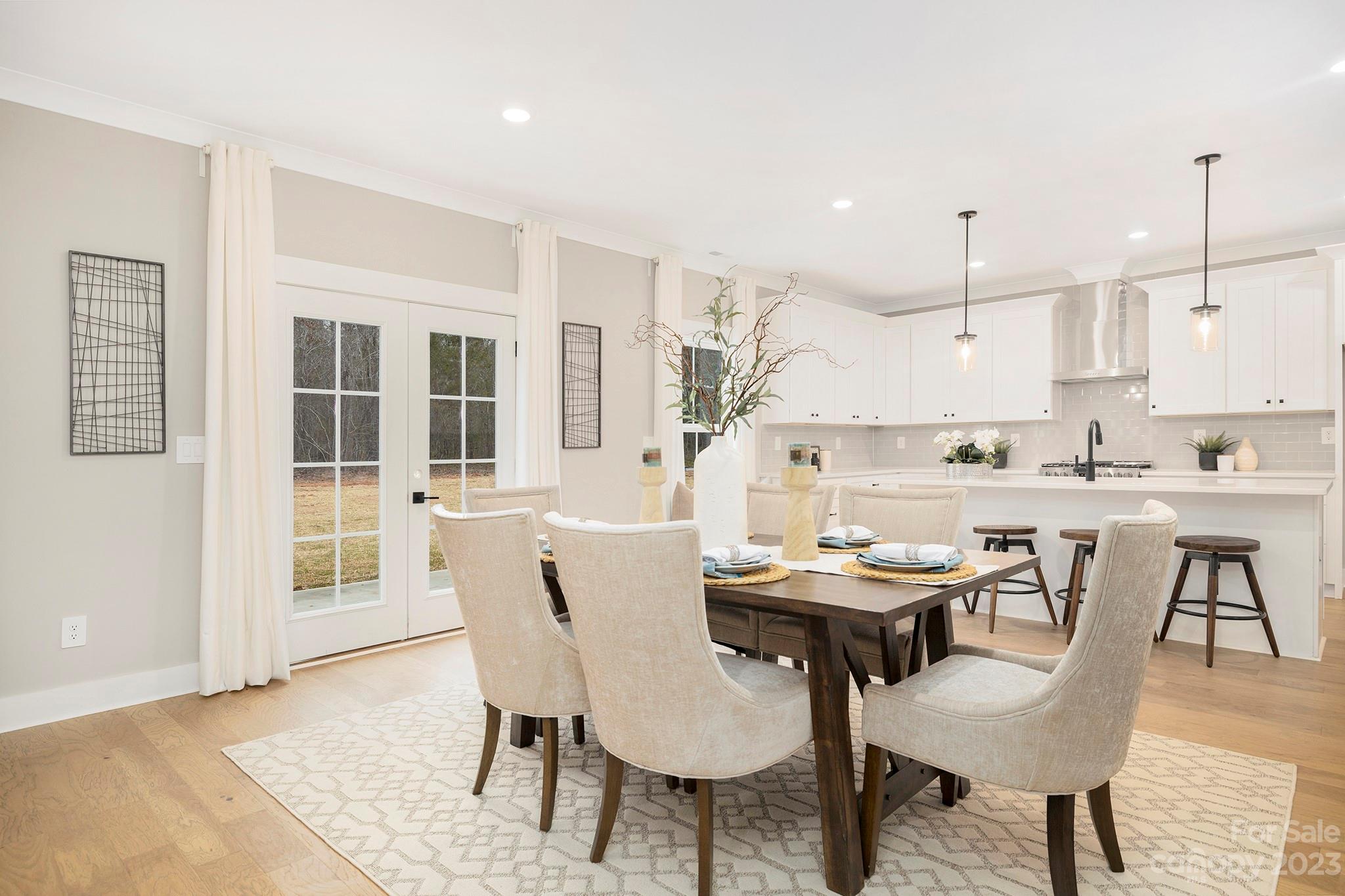 1712 Greyfox Estates Road Lancaster, SC 29720 - Photo 10 of 32 a view of a dining room with furniture and wooden floor