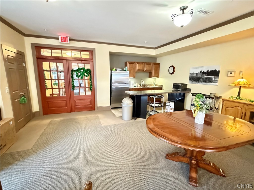 28 Maple Street, Unit 103 Marcellus, NY 13108 - Photo 31 of 41 Common meeting area