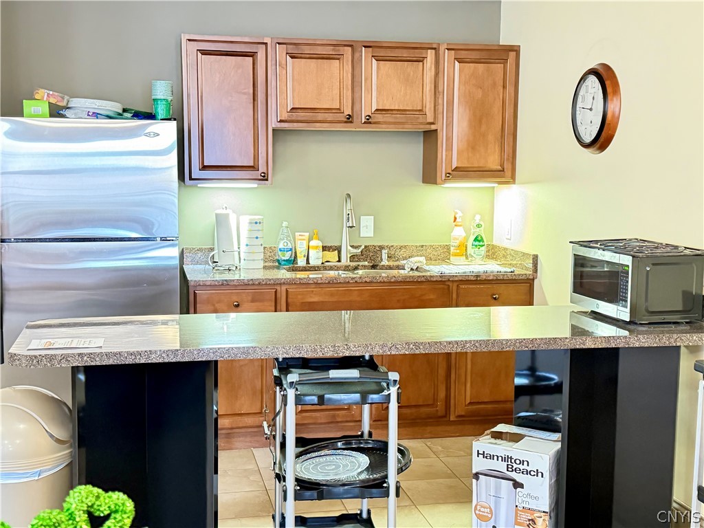28 Maple Street, Unit 103 Marcellus, NY 13108 - Photo 32 of 41 Common meeting area-kitchenette
