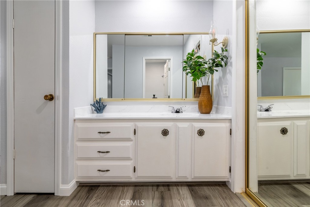 24363 Briggs Road Menifee, CA 92585 - Photo 24 of 43 a bathroom with a sink and a mirror