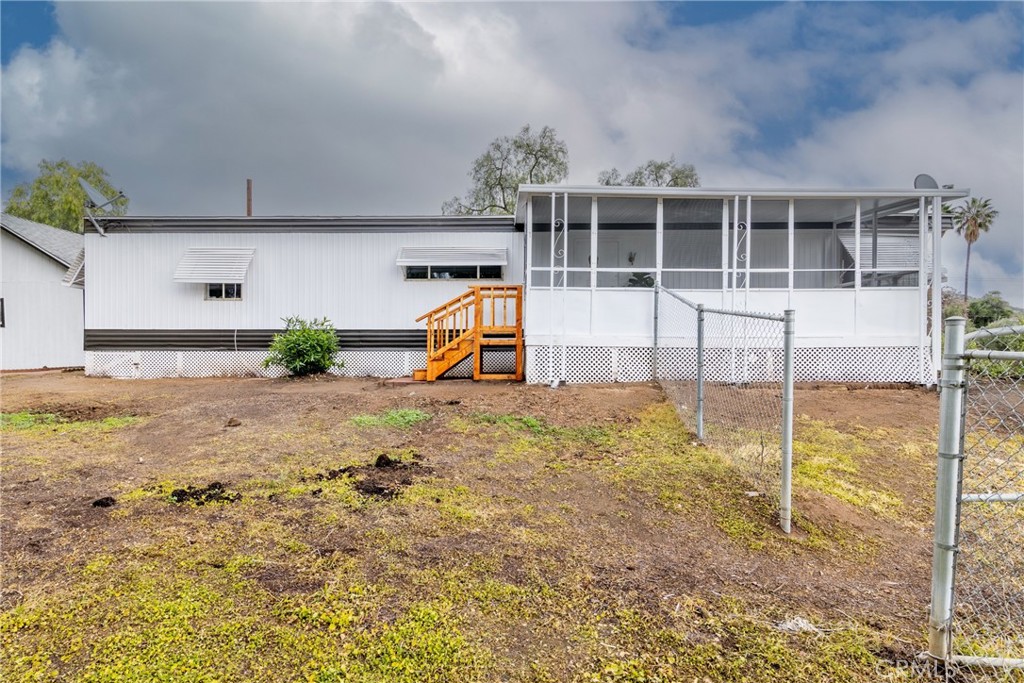 24363 Briggs Road Menifee, CA 92585 - Photo 37 of 43 a view of a house with a backyard
