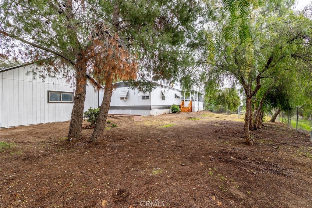 24363 Briggs Road Menifee, CA 92585 - Photo 39 of 43 a view of large tree in front of a house
