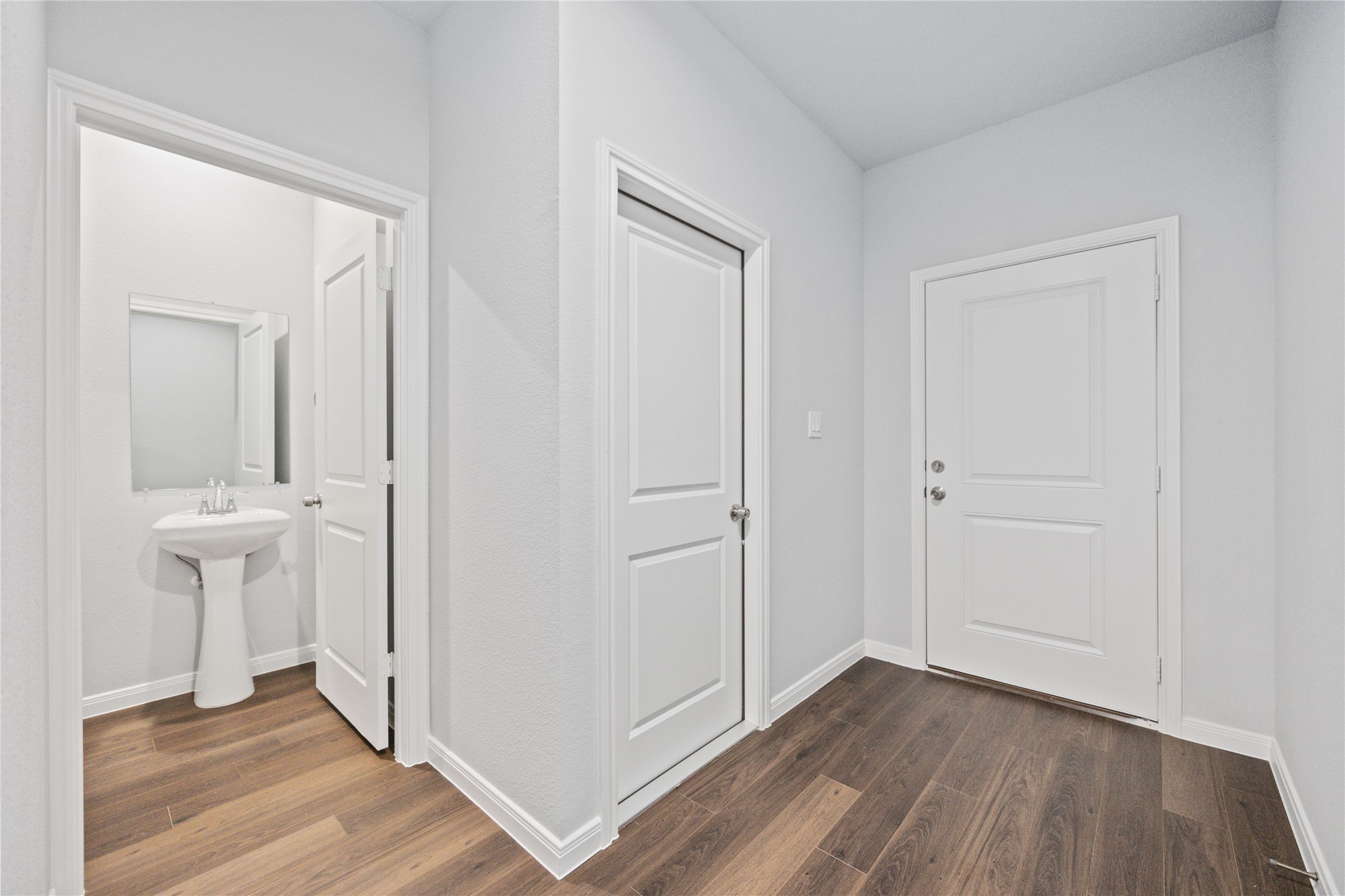 18831 Luminescent Ln Spring Spring, TX 77379 - Photo 8 of 36 an empty room with wooden floor and closet area