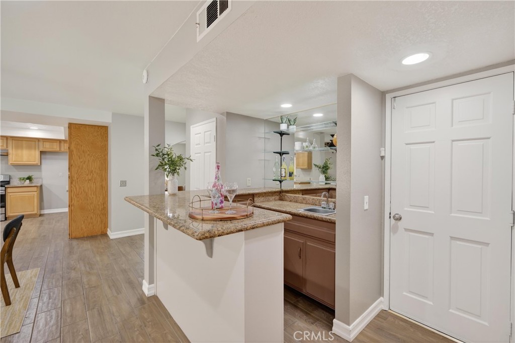 6836 Rycroft Drive Riverside, CA 92506 - Photo 12 of 37 Bar area equips with bar sink