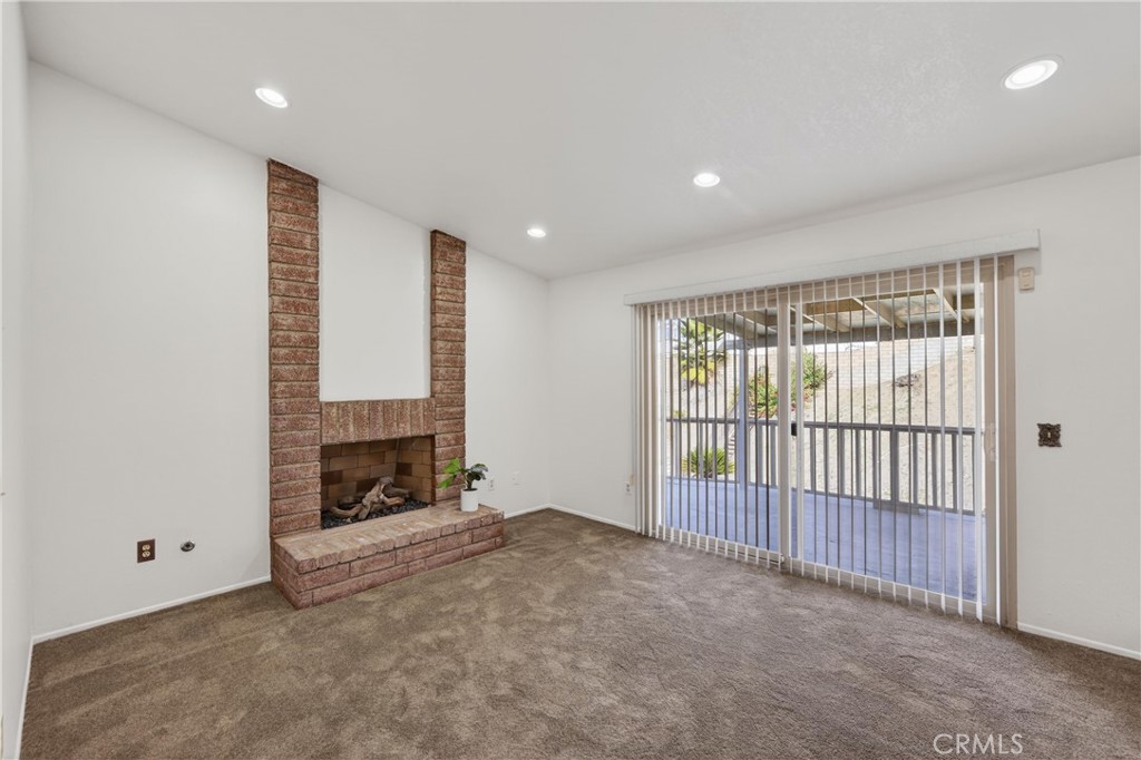 6836 Rycroft Drive Riverside, CA 92506 - Photo 17 of 37 Beautiful fireplace in primary suite