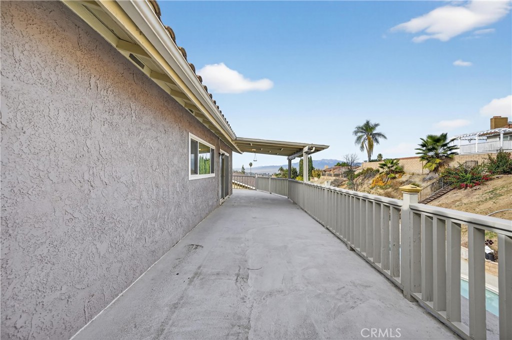 6836 Rycroft Drive Riverside, CA 92506 - Photo 20 of 37 Peak-a-boo view of the mountains and city in the distance