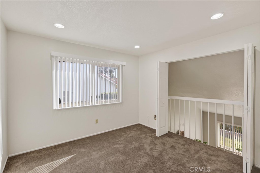 6836 Rycroft Drive Riverside, CA 92506 - Photo 29 of 37 Bedroom #2 doors close to seal off the balcony