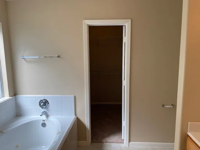 a bathroom with a bathtub