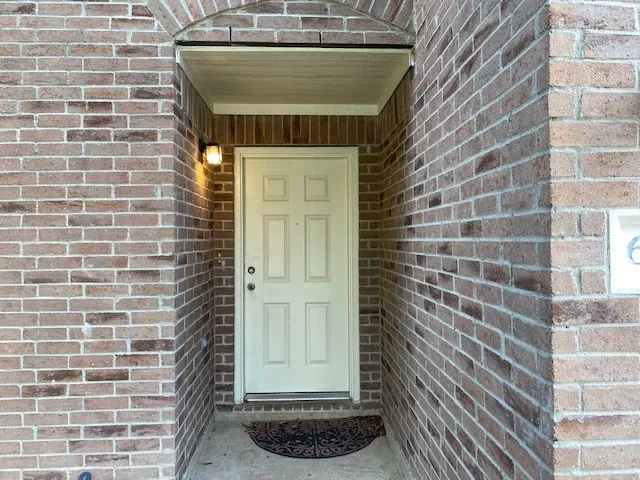 a front view of a house with a shower