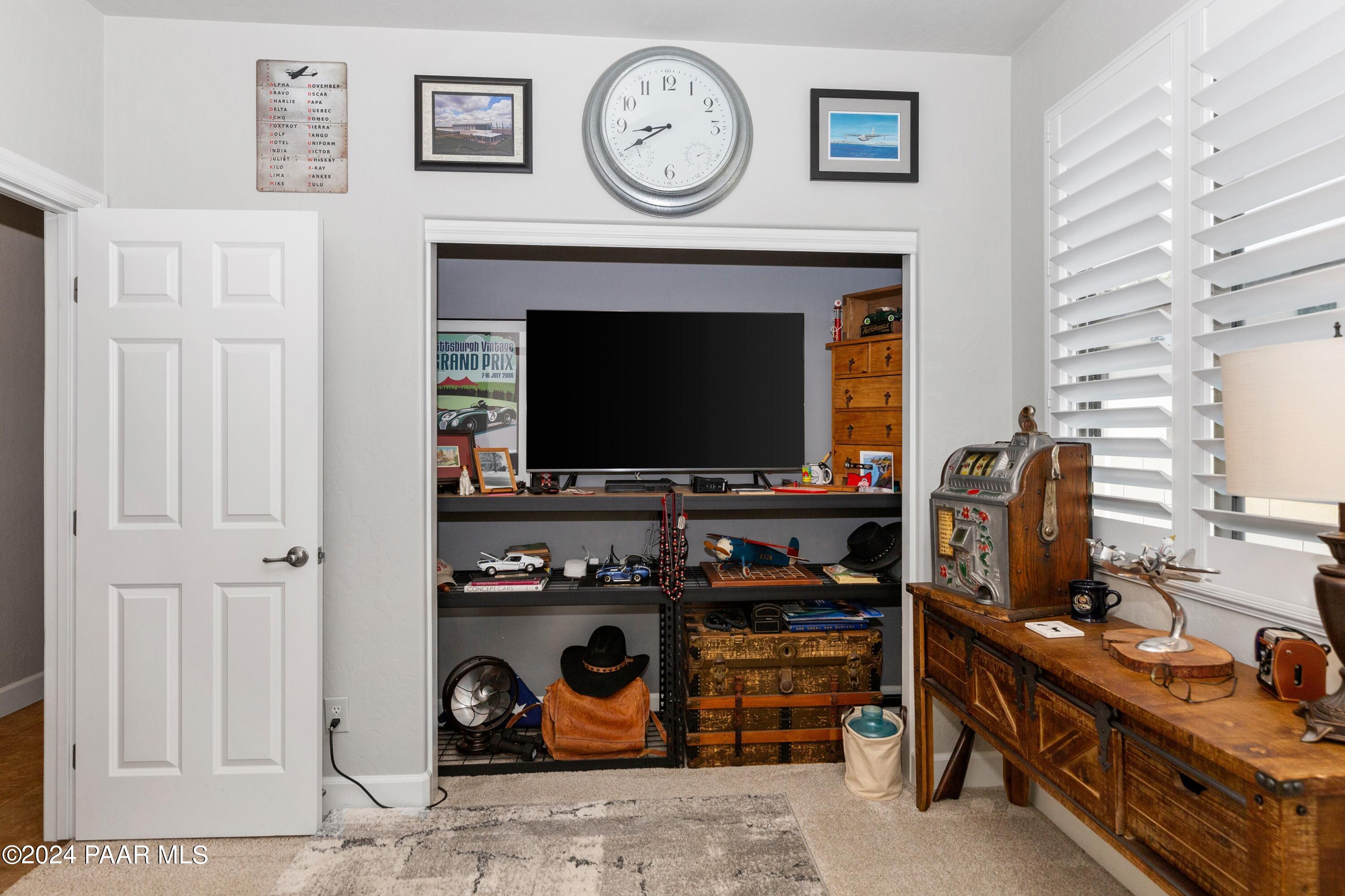 1219 Stack Rock Road Prescott Valley, AZ 86314 - Photo 25 of 41 a living room with furniture and a fireplace